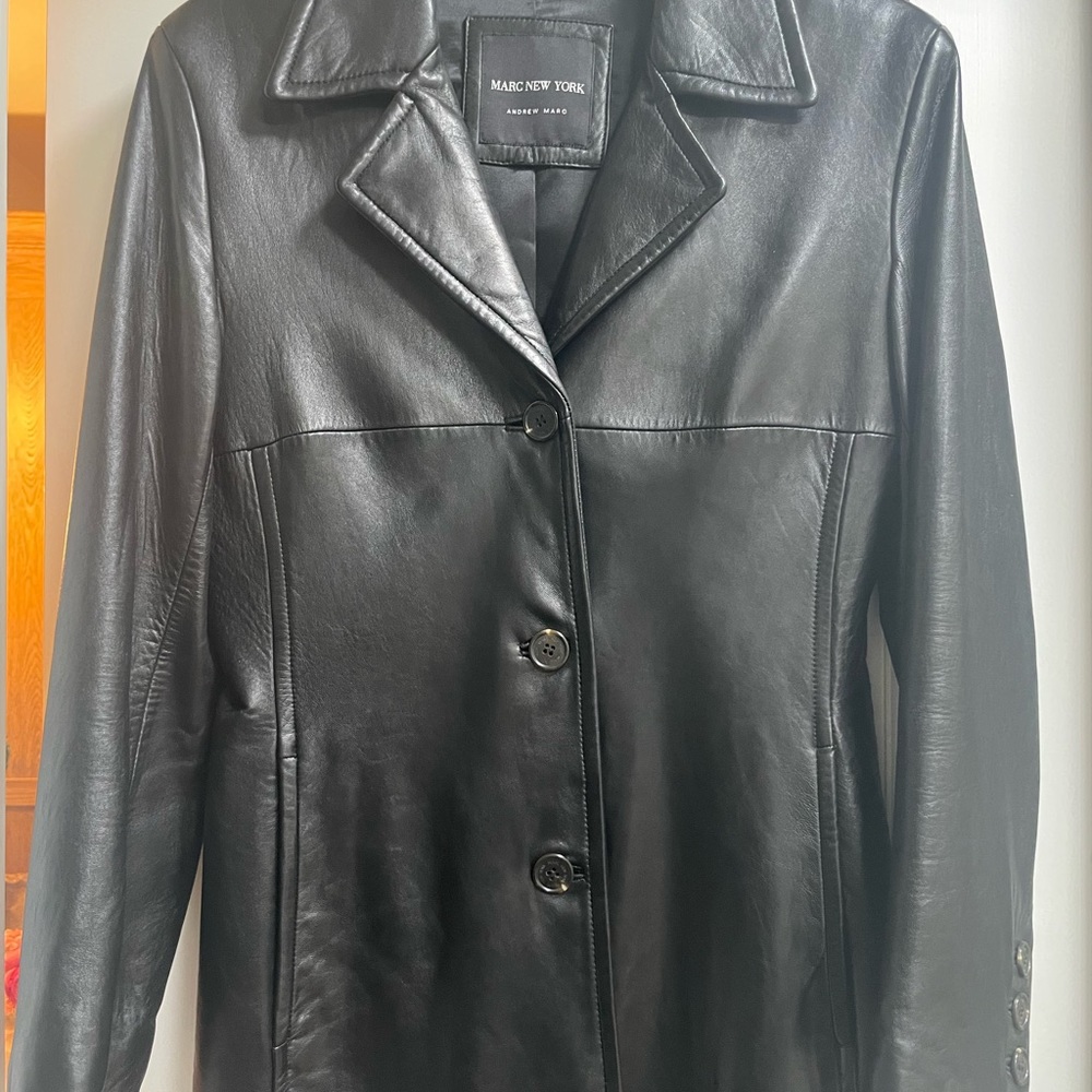 Beautiful designer leather trench coat. Size XS/S. 100% leather. Like new.